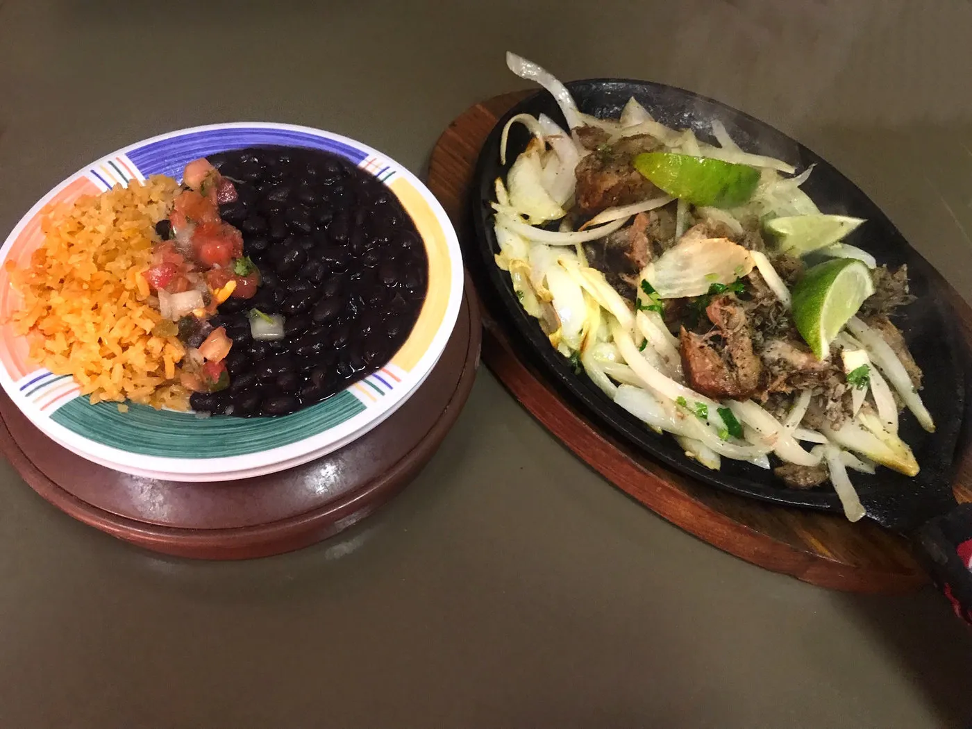 Sizzling fajitas in a cast-iron skillet